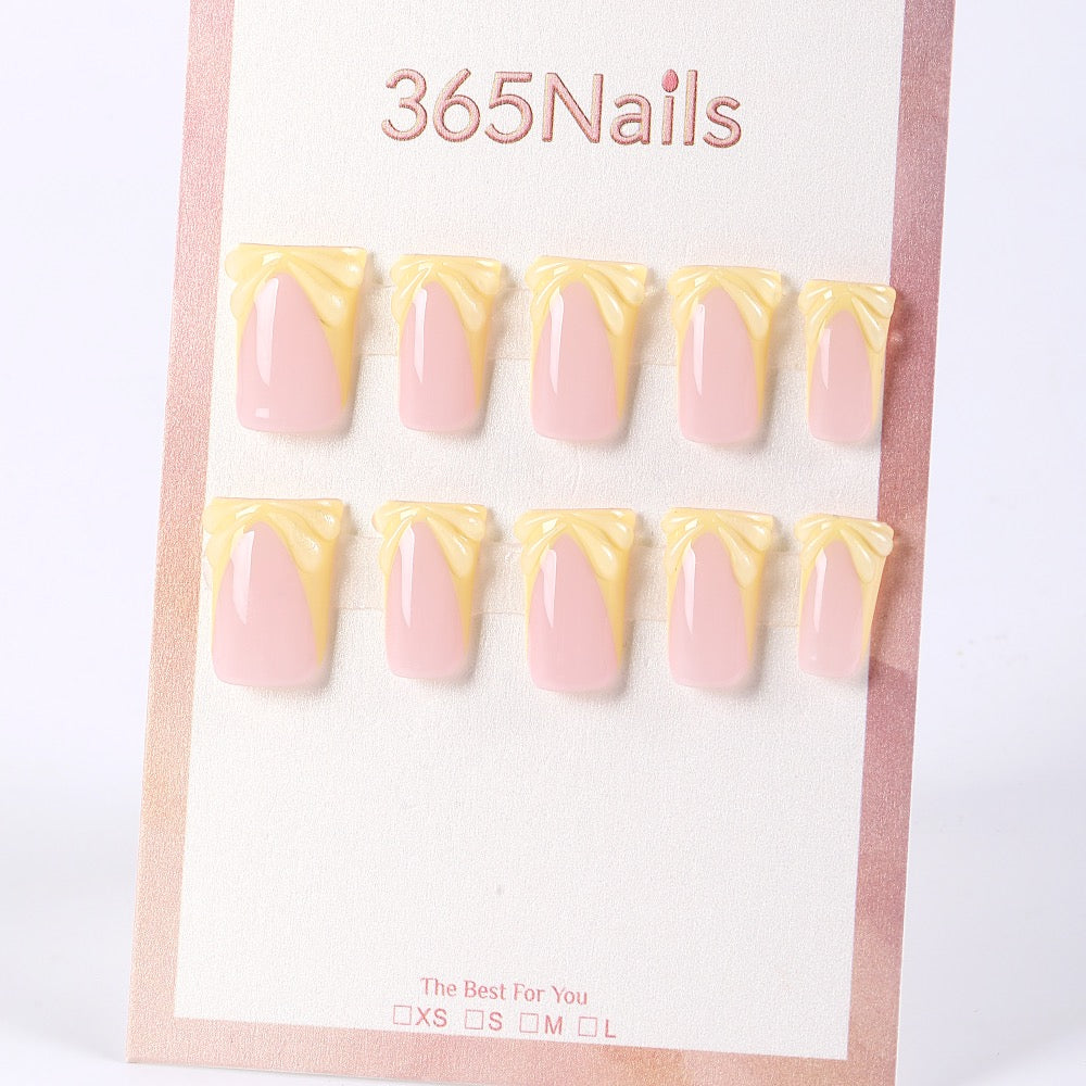 365nails butter‑yellow 3D bow French press-onsSold in packs of 5. Minimum order: 1 pack (5 pcs). Quantity = number of packs. Qty 1 = 5 pcs
