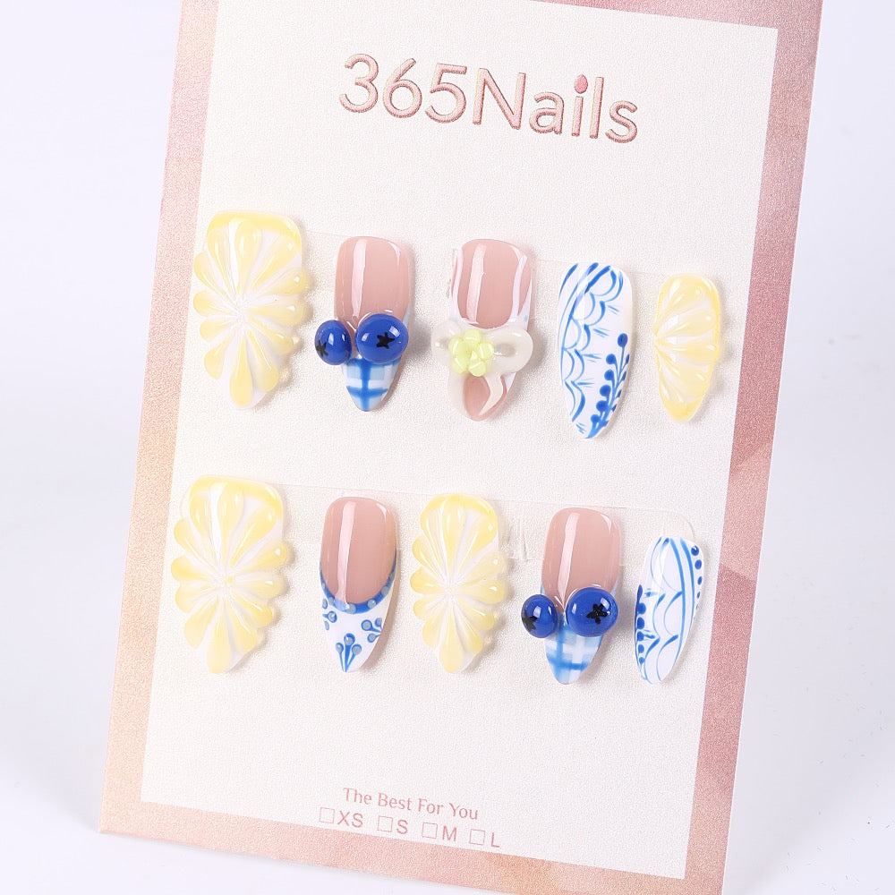 365Nails Butter Yellow Floral Carving with Blue‑White Porcelain Patterns, Jelly Beads & French Mix – Fresh Medium Almond Press‑On NailsSold in packs of 5. Minimum order: 1 pack (5 pcs). Quantity = number of packs. Qty 1 = 5 pcs
