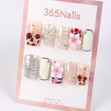 Uñas postizas 365Nails Cherry Bloom con mezcla iridiscente.