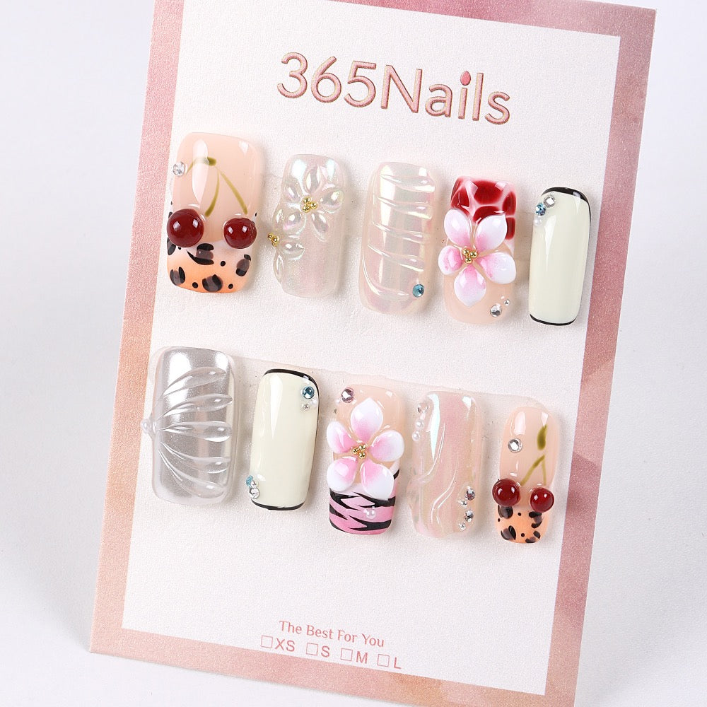 Uñas postizas 365Nails Cherry Bloom con mezcla iridiscente.