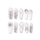 365Nails Icy Milky White with Silver Luxe—Metal Shards, Crystal Rhinestones and Glitter Lattice – Glam Medium-Long Coffin Press-On NailsSold in packs of 5. Minimum order: 1 pack (5 pcs). Quantity = number of packs. Qty 1 = 5 pcs