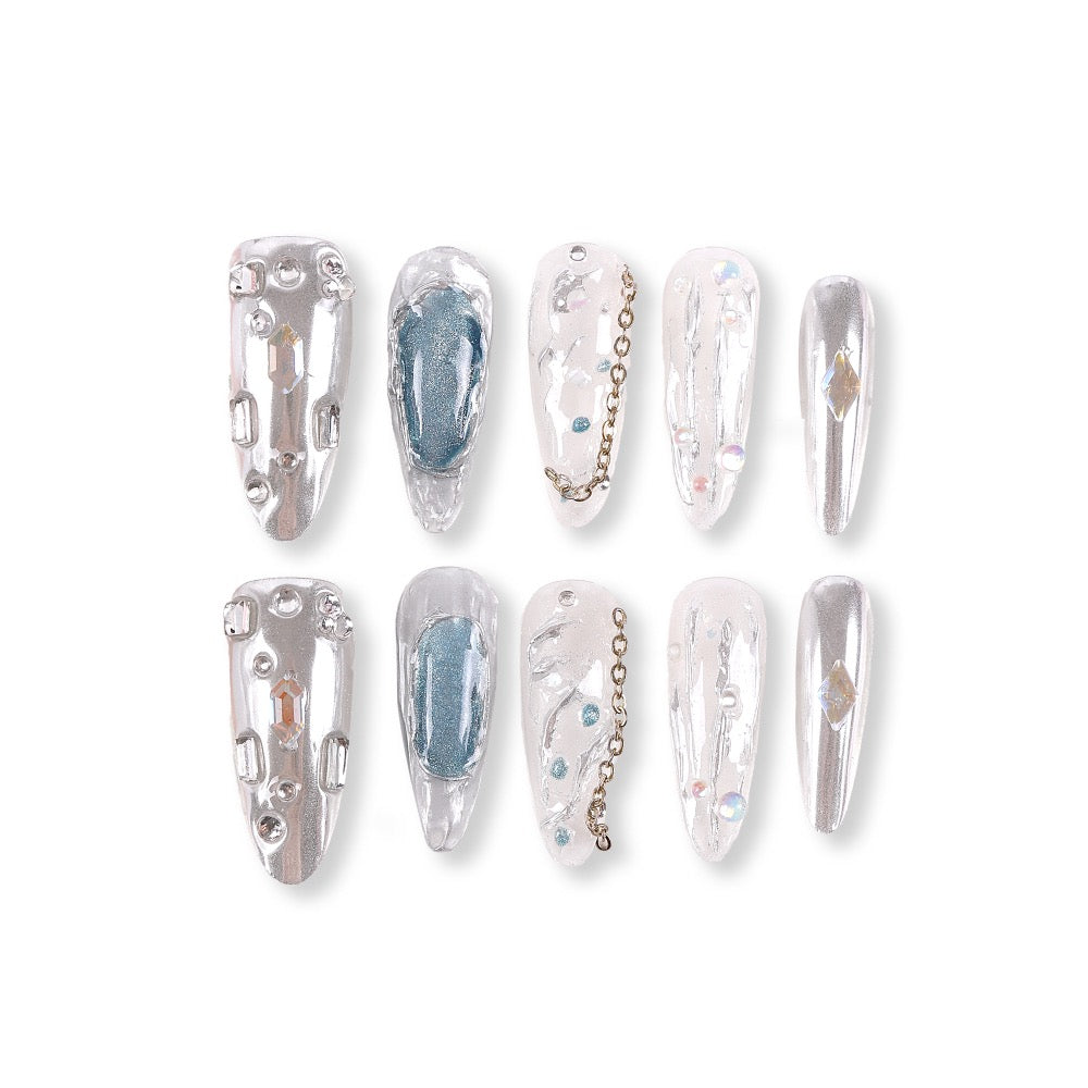 365Nails Crystal Jelly Long Stiletto Press On Nails in Silver with Chains and GemsSold in packs of 5. Minimum order: 1 pack (5 pcs). Quantity = number of packs. Qty 1 = 5 pcs