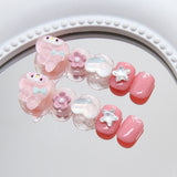 Uñas infantiles tiernas y juguetonas con diseño de conejo rosa, flores y estrellas de amor | 365nails