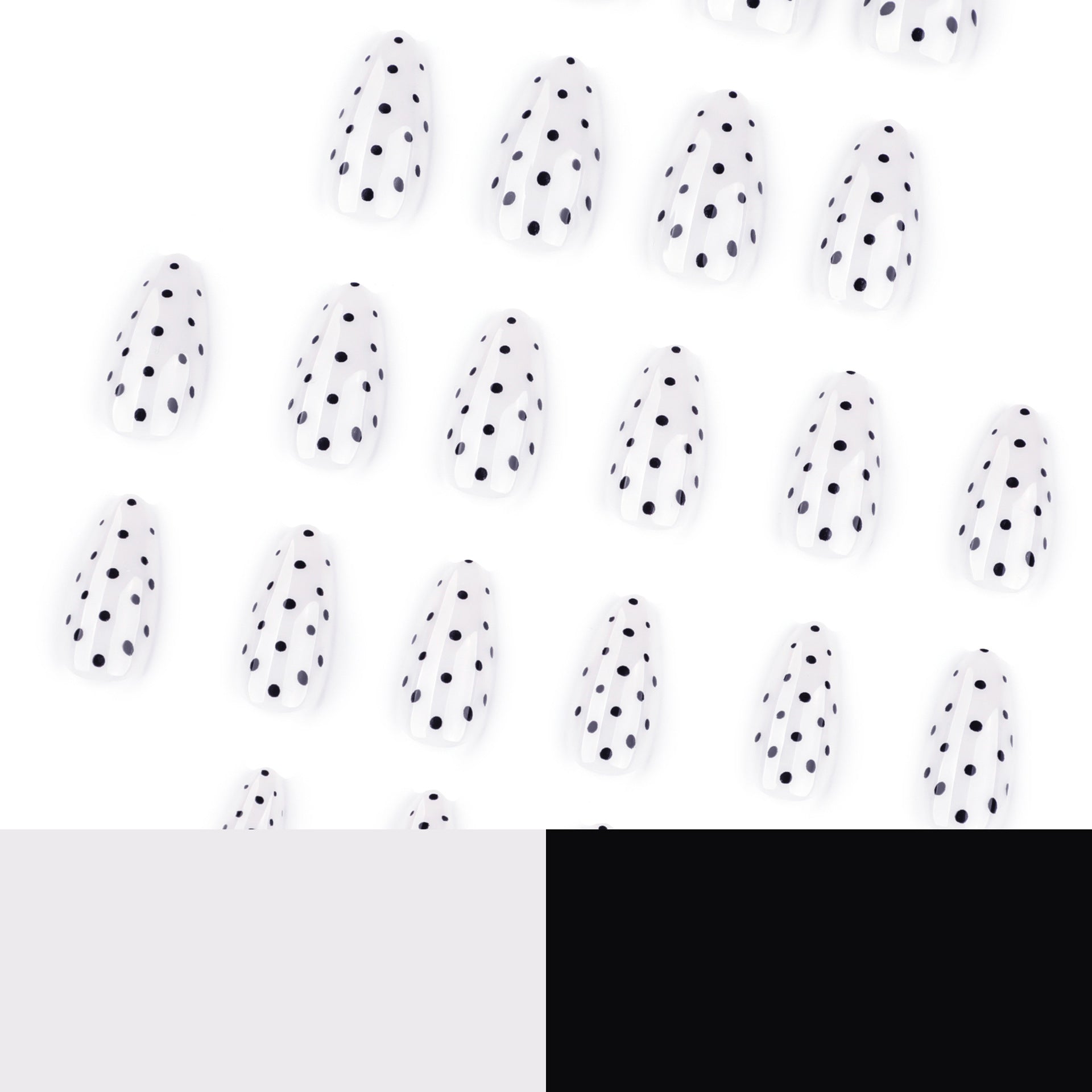 Black dots almond on white background press-on nails