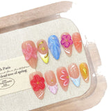 Uñas francesas de alta gama con degradado de flores transparentes y efecto hielo | 365nails