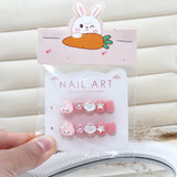 Uñas infantiles tiernas y juguetonas con diseño de conejo rosa, flores y estrellas de amor | 365nails