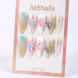 365Nails Uñas postizas largas de estilete color melocotón transparente con degradado menta-azul, pétalos 3D, lazos de cristal y detalles de mariposas.