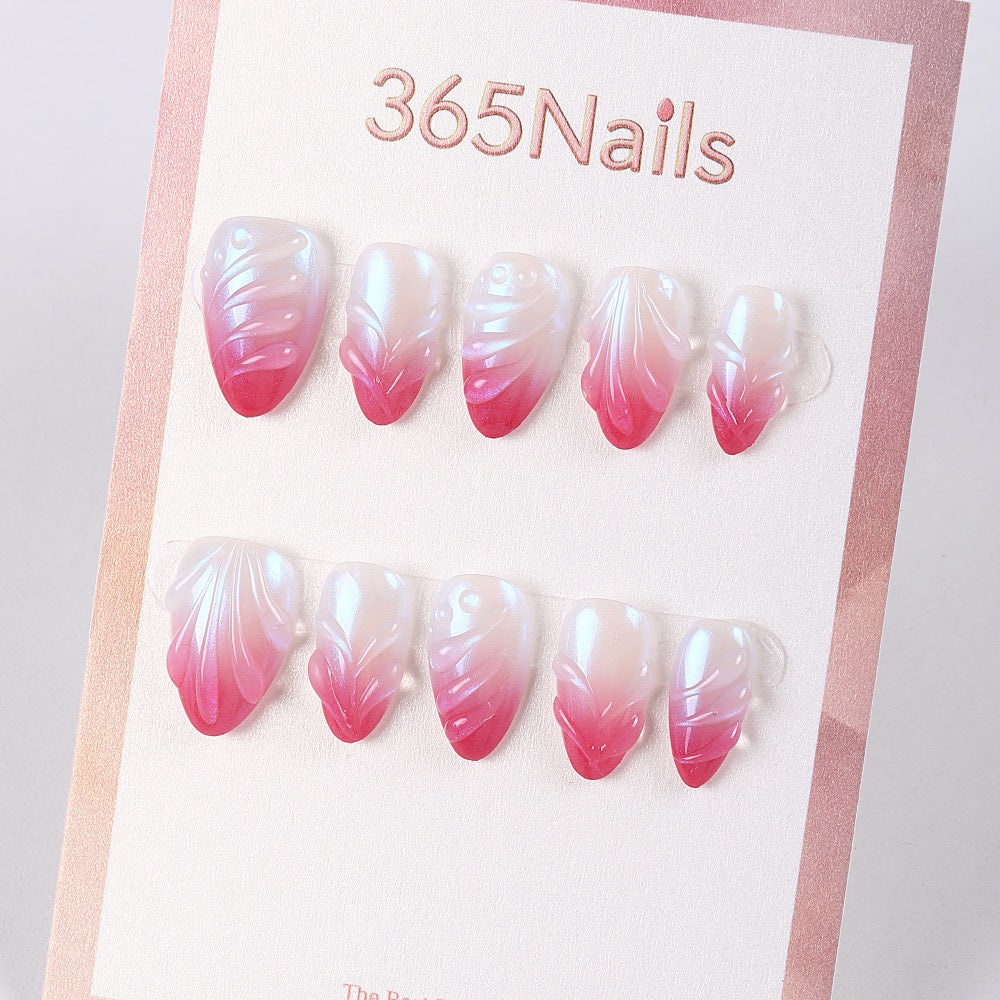 Uñas postizas 365Nails color rosa perla con efecto degradado.