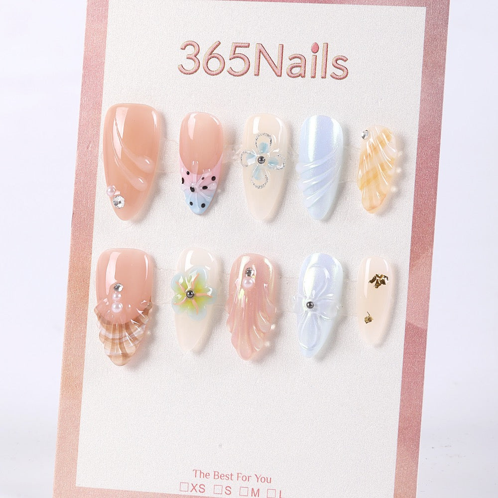 365nails milky apricot jelly with shell carving and mini rhinestones press-onsSold in packs of 5. Minimum order: 1 pack (5 pcs). Quantity = number of packs. Qty 1 = 5 pcs