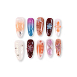 Uñas postizas 365nails de otoño con acabado de gelatina mixta, flores 3D y gotas de rocío.