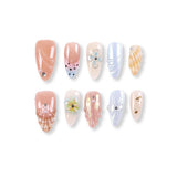 365nails milky apricot jelly with shell carving and mini rhinestones press-onsSold in packs of 5. Minimum order: 1 pack (5 pcs). Quantity = number of packs. Qty 1 = 5 pcs