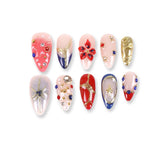 365nails nude base mix with blue-red-gold stars & gems almond press-onsSold in packs of 5. Minimum order: 1 pack (5 pcs). Quantity = number of packs. Qty 1 = 5 pcs