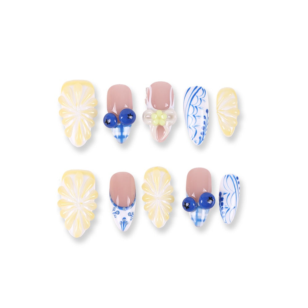 365Nails Butter Yellow Floral Carving with Blue‑White Porcelain Patterns, Jelly Beads & French Mix – Fresh Medium Almond Press‑On NailsSold in packs of 5. Minimum order: 1 pack (5 pcs). Quantity = number of packs. Qty 1 = 5 pcs