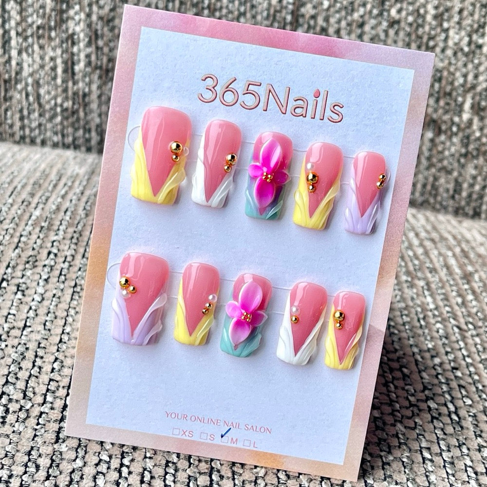 Handmade medium square press-on nails with pastel 3D floral wave, gold beads, and V French tips.