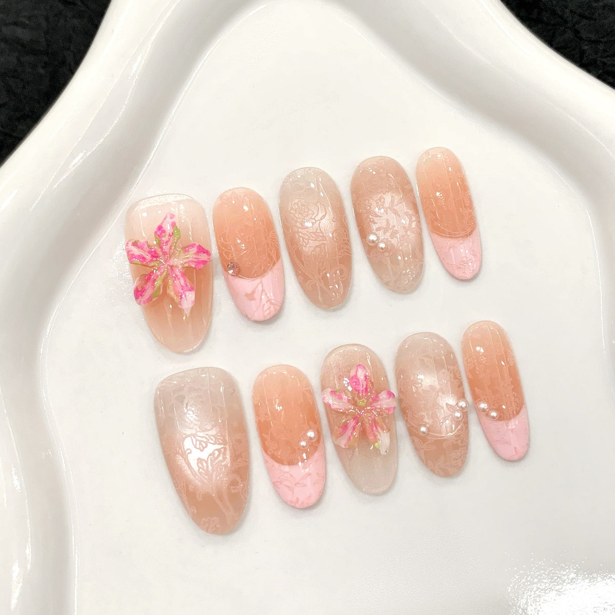 Private-label press-on nail set with 3D floral French tip design, short square shape, suitable for retail display planning.