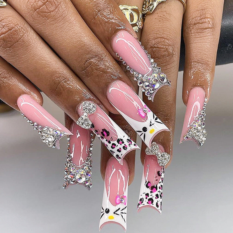 Leopard print press-on nails with full diamond kitty design, 24-piece set ideal for wholesale suppliers catering to online beauty sellers.