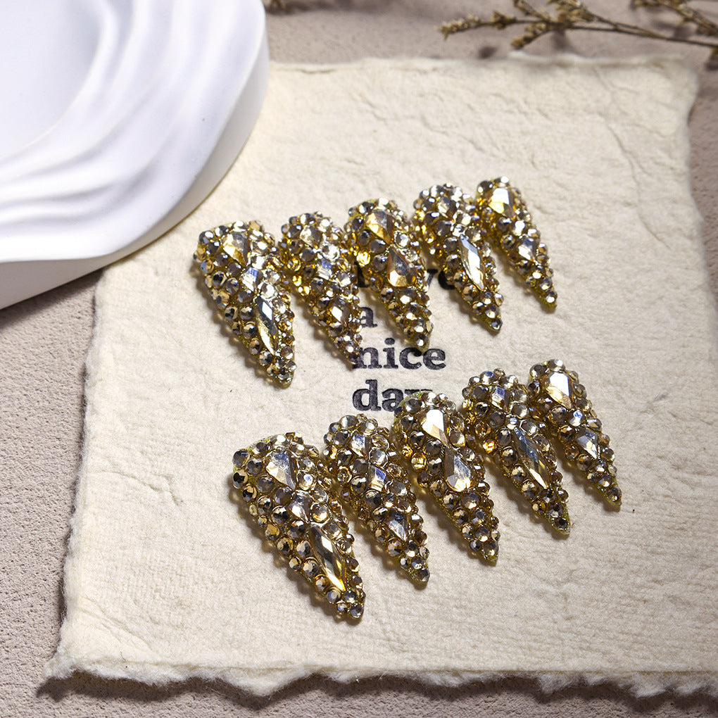Gold K9 crystal luxury stiletto press-on nails set with faceted rhinestones and glossy finish
