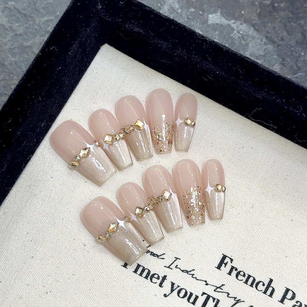 Press on nail wholesale salon retail inventory planning with champagne cat eye coffin press-on nails