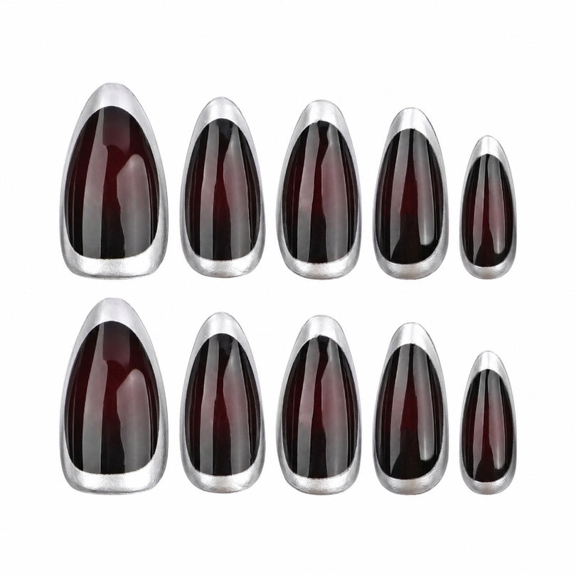 Ten almond press-on nails in five different sizes with silver metallic rims