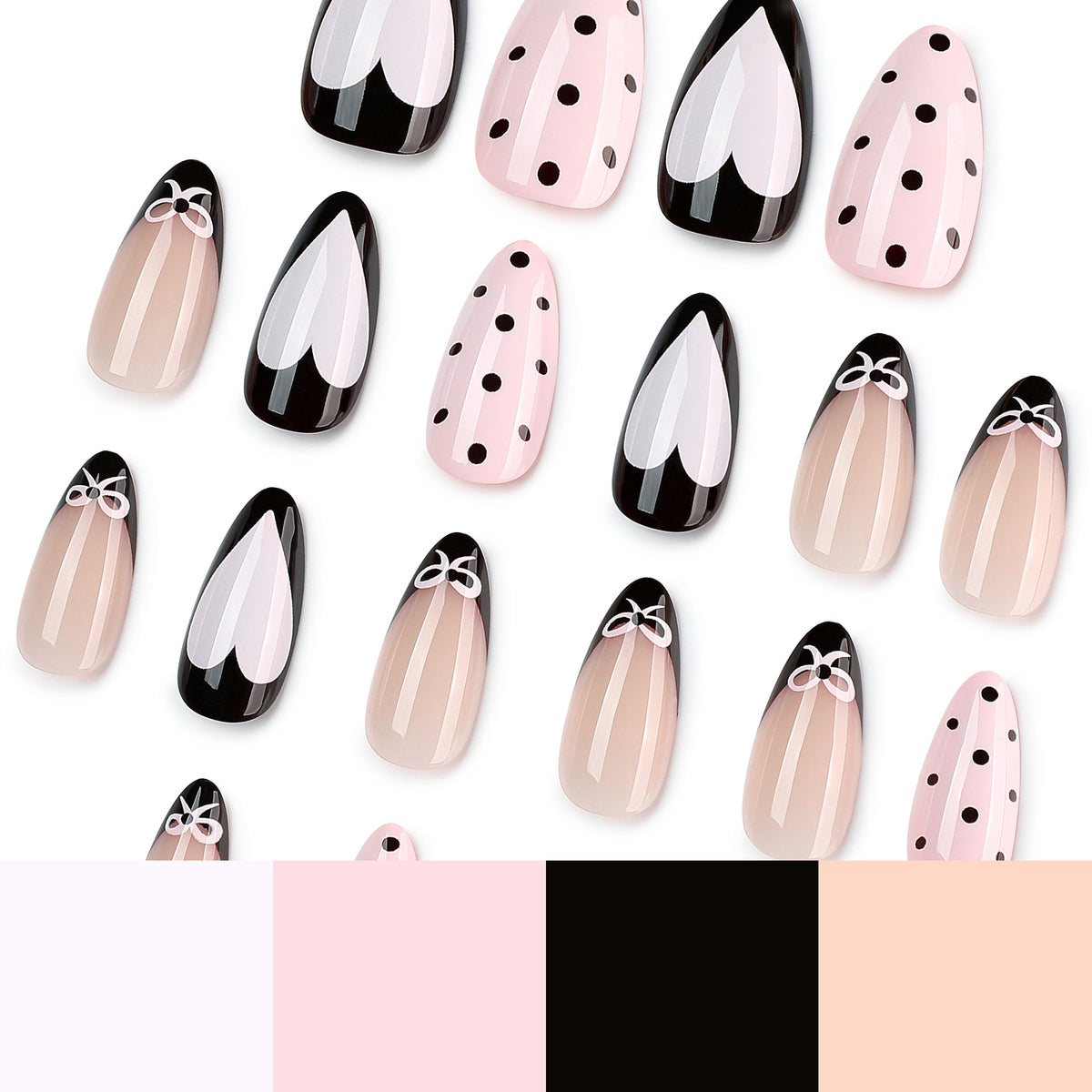Scattered press-on nails with heart, bow, and polka dot patterns.