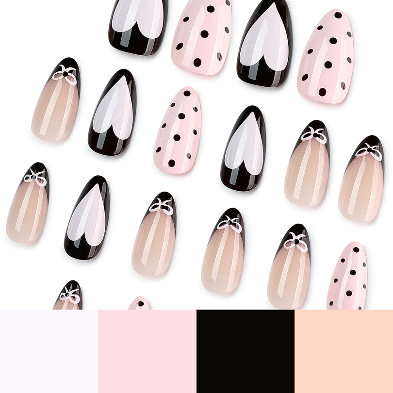Scattered press-on nails with heart, bow, and polka dot patterns.