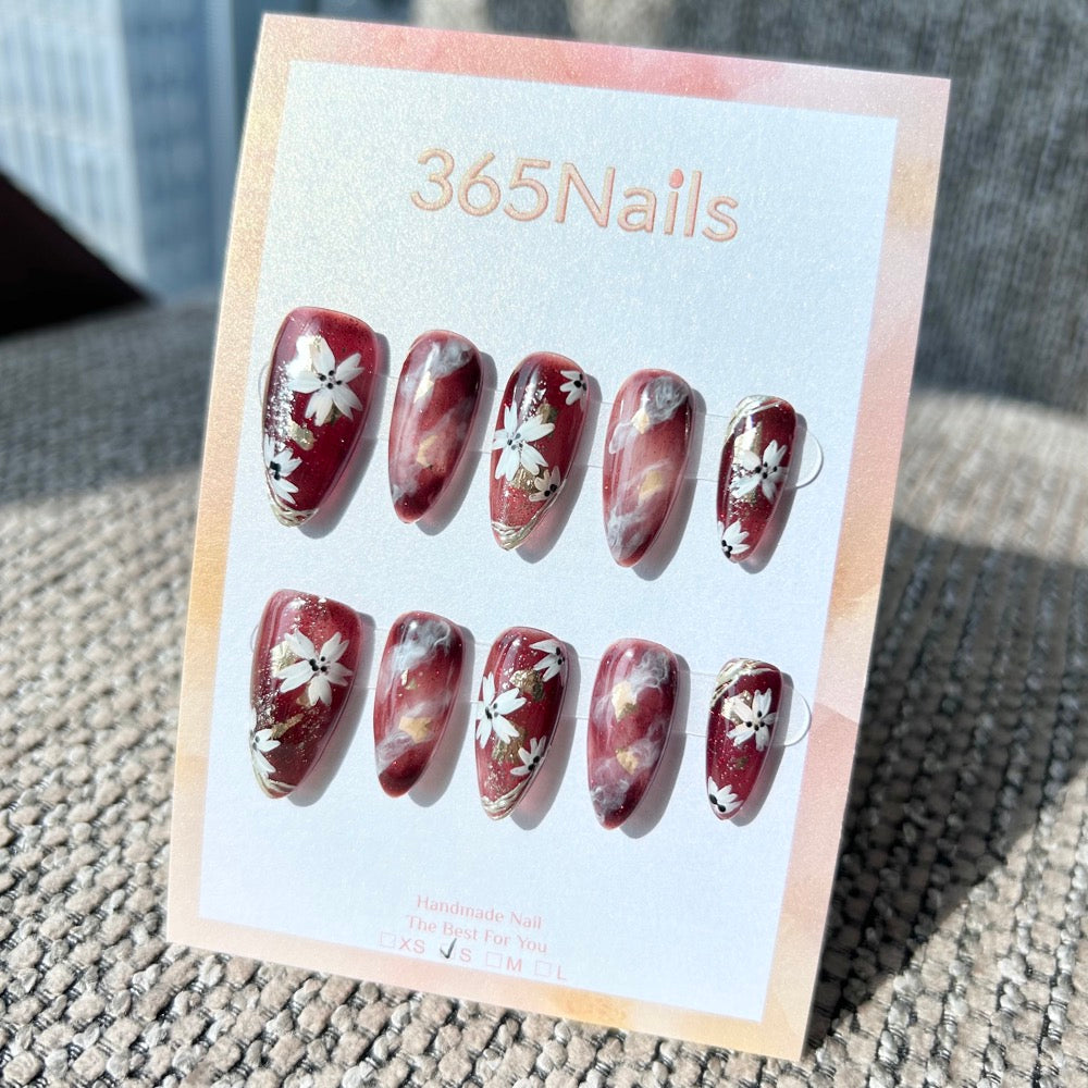 Ethereal Ink: "Crimson Floral Mist" – Burgundy Marble with Hand-Painted White Flowers & Gold Foil Almond Nails