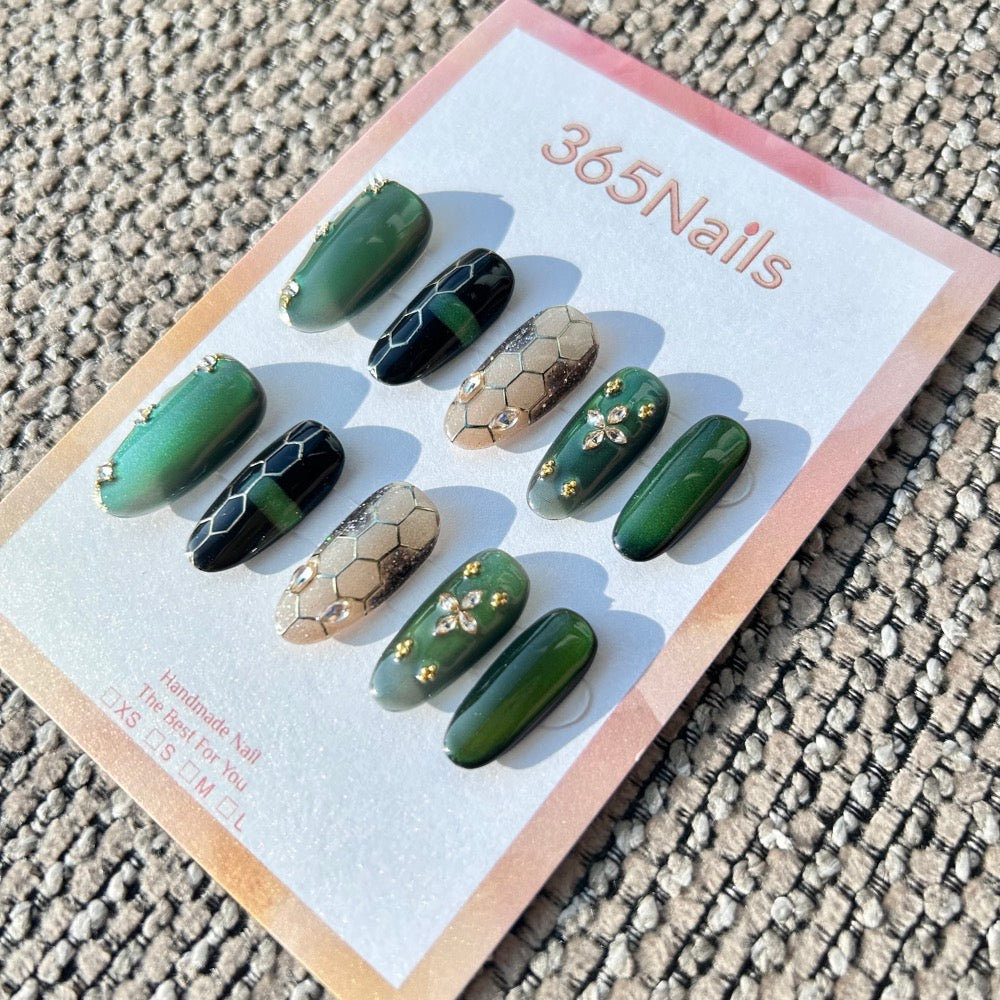 The Gilded Serpent: "Emerald Mamba" – Deep Green Cat Eye & Champagne Honeycomb Handmade Press-On Nails with Crystal Starburst