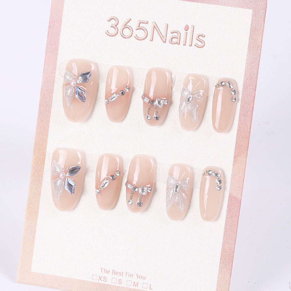 365Nails Lazos Rosa Nude con Adornos de Diamantes de Imitación Colgantes — Uñas Postizas Suaves de Almendra Mediana-Corta