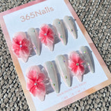 Sculpted Flora: "Aurora Peach Blossom" – 3D Translucent Pink Flowers on Pearlescent White Stiletto Nails