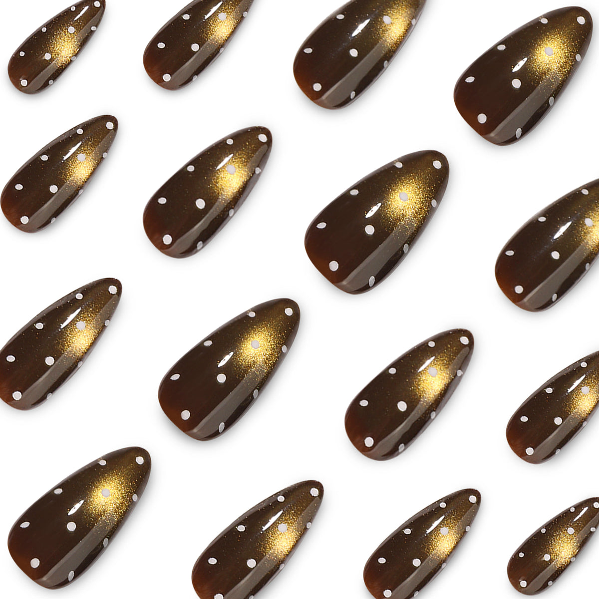 Close-up of multiple brown almond nails with white dots and golden magnetic cat-eye glow