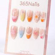 Uñas postizas 365nails de verano, color pétalo de gelatina degradado con cristales diminutos.