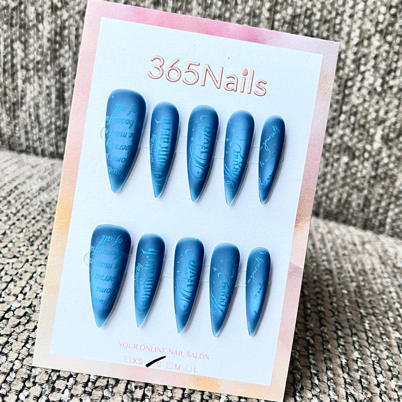 Matte Blue Embossed Text Stiletto Press-On Nails