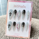 Femme Fatale: "Frozen Stigmata" – Icy Blue Cat Eye with Silver Cross Charm, Black Smudge & Crimson Thorn Art Long Stiletto Nails