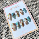 Ethereal Ink: "Mint Amber Flow" – Mint Green Cat Eye & Caramel Amber Marble with Gold Foil Almond Nails
