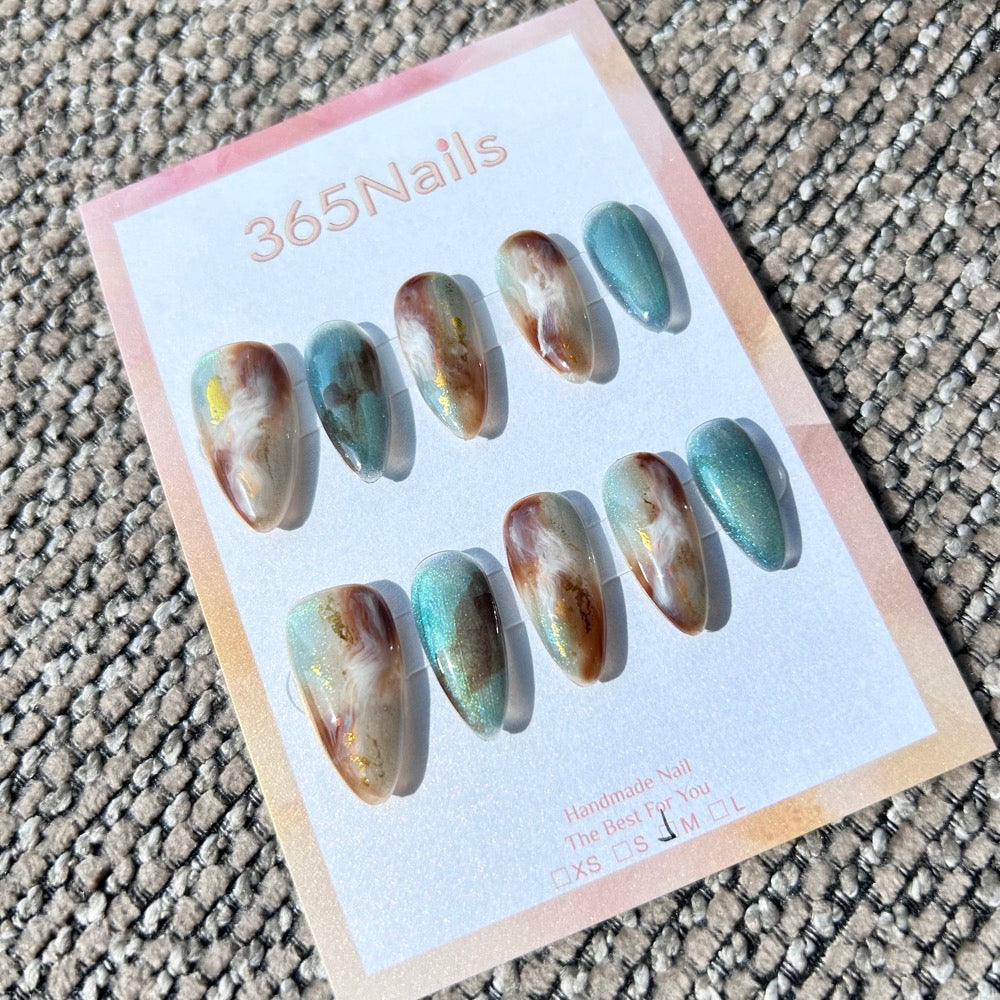 Ethereal Ink: "Mint Amber Flow" – Mint Green Cat Eye & Caramel Amber Marble with Gold Foil Almond Nails