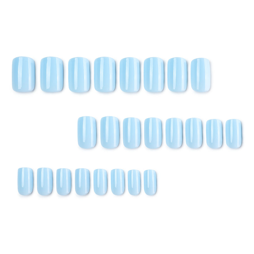 Set of 24 light blue square nail tips arranged in rows.