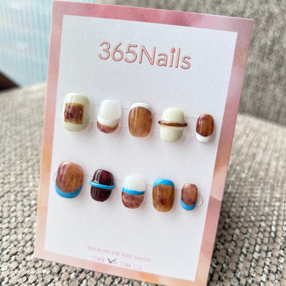 Modern Chic: "Amber & Blue Ring" – Tortoiseshell Marble, 3D Raised Ring, Creamy White & Blue French Tip Short Nails