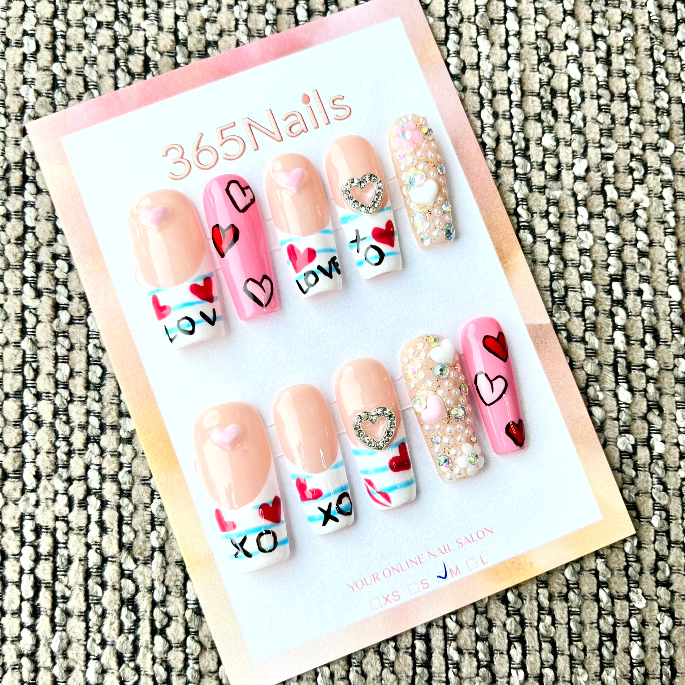Sweet Love : ongles press-on forme coffin longs — motif cœur XO LOVE