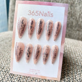 Femme Fatale: "Urban Scripture" – Nude Pink Jelly Base with Black Ink Smudge & Silver Gothic Lettering Long Stiletto Nails