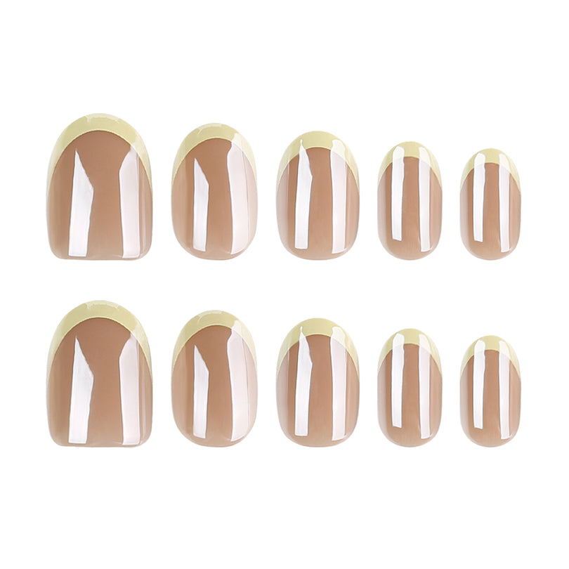 Set of press-on nails in multiple sizes with yellow French tips