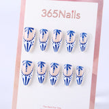 Blue and white porcelain with blue and white dots, hand-painted almond design in the middle Press On Nail