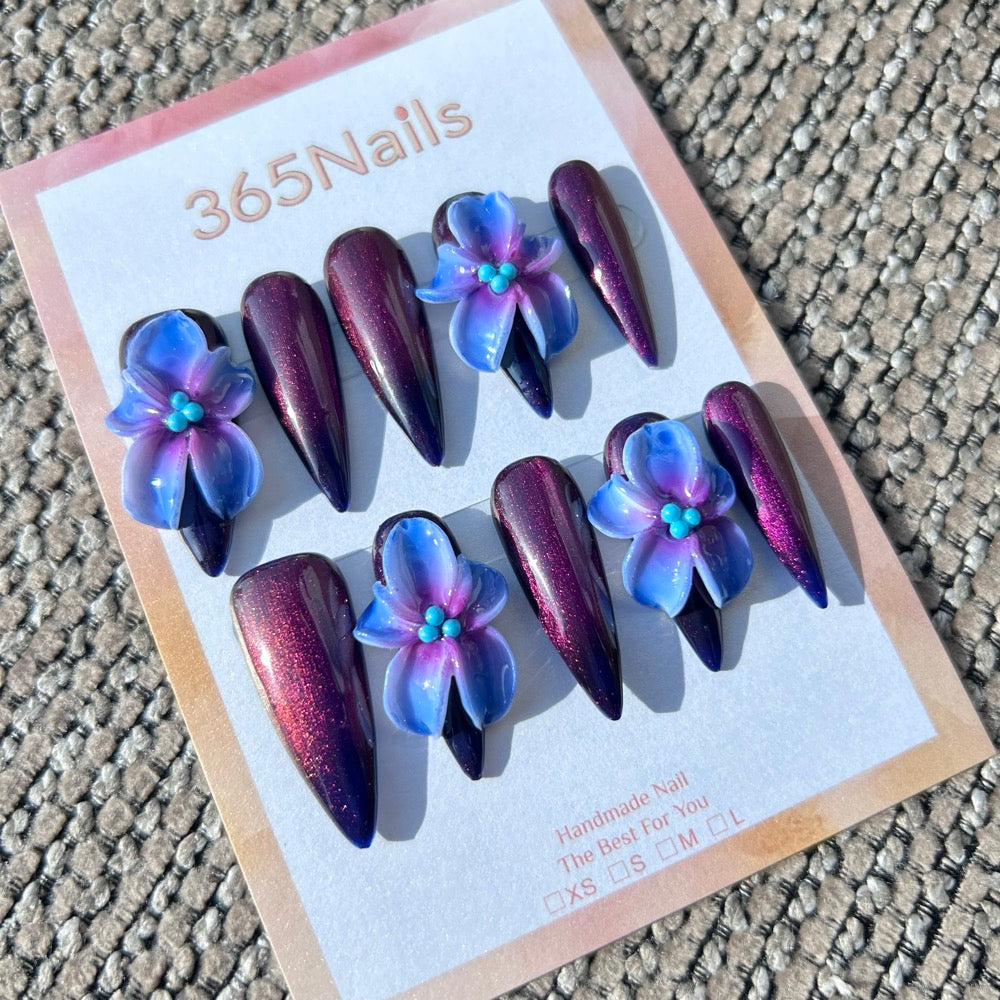 Sculpted Flora: "Cosmic Violet Galaxy" – 3D Blue-Purple Gradient Flower on Dark Cat Eye Stiletto Nails