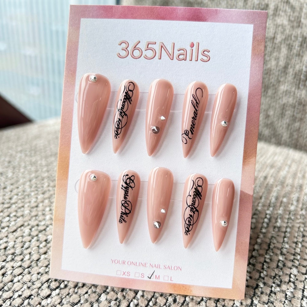 Femme Fatale: "Gothic Script" – Nude Pink Base with Black Old English Text & Silver Studs Long Stiletto Nails