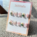 Sweet & Dopamine: "Sugar Pink Tulip" – Glitter Pink Base, 3D Yellow Tulips, White Bow & Pearl Chain Press-on Nails