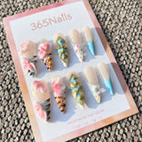 Sculpted Flora: "Baroque Tiger & Pink Flora" – 3D Pink Flowers on Tiger Print with Blue Jeweled Cross Stiletto Nails