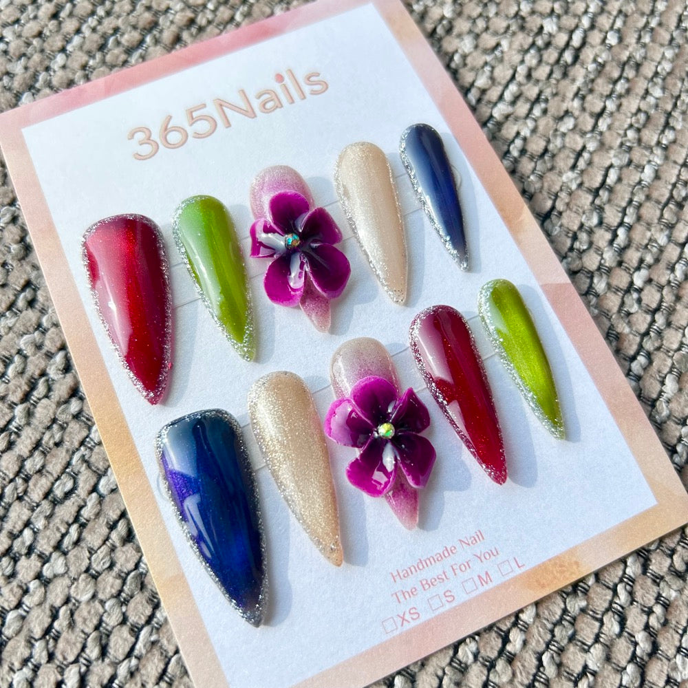 Sculpted Flora: "Jewel Tone Blossom" – 3D Purple Floral & Multicolor Glitter Edge Long Stiletto Nails
