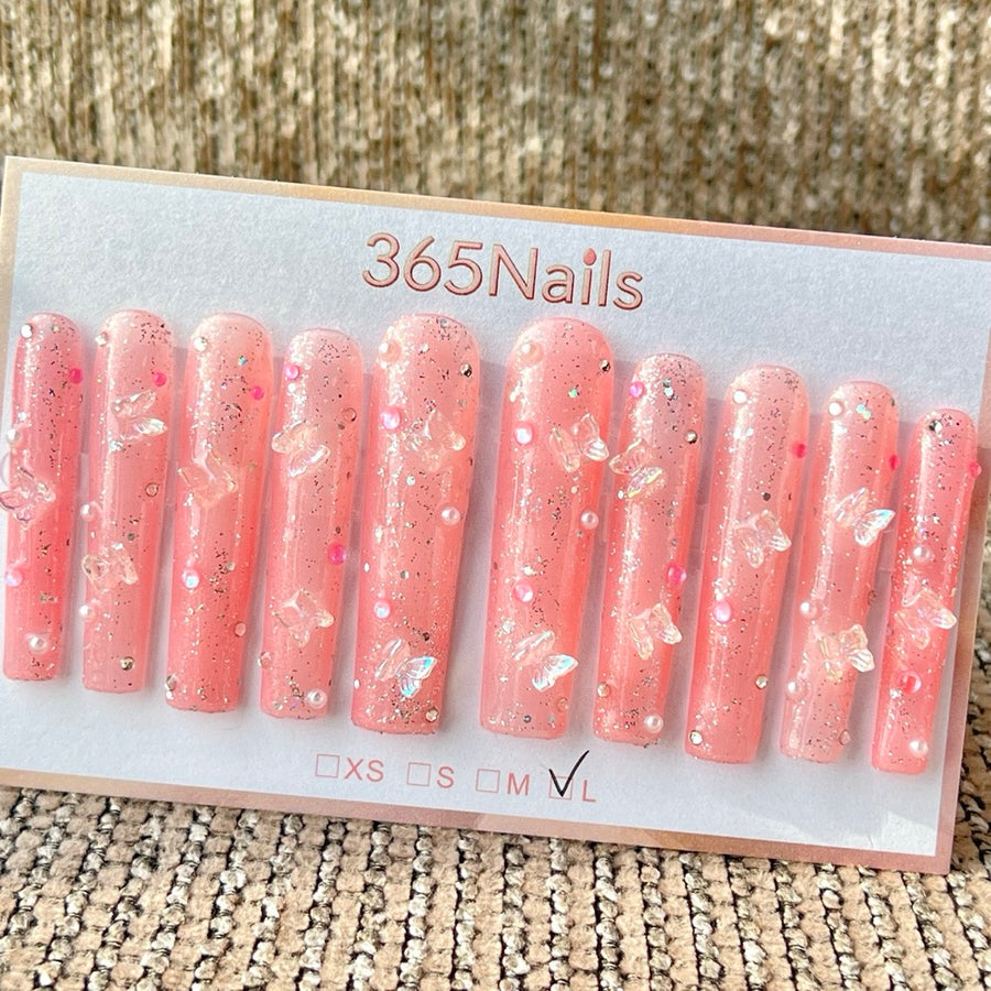 365nails — Papillon rose pailleté — ongles press-on longs, forme trapèze, fait main