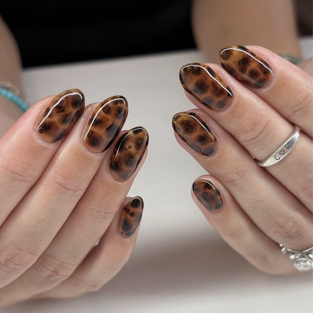 French Animal Print Glossy Brown Almond Short Press On Nails – Design 18