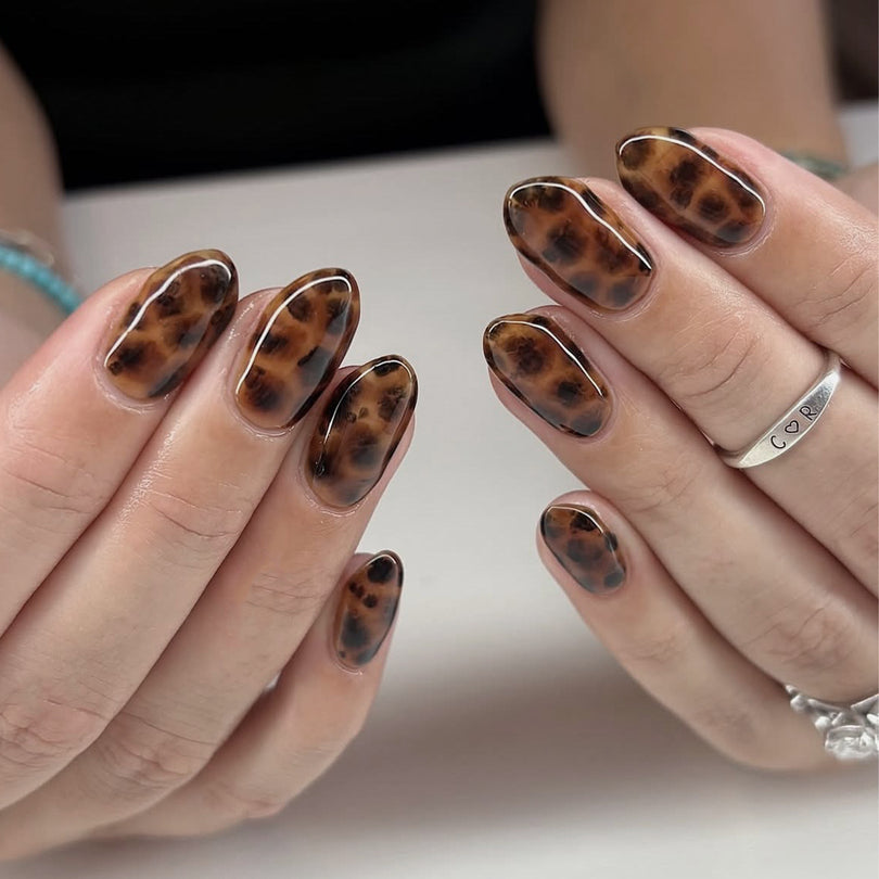 French Animal Print Glossy Brown Almond Short Press On Nails – Design 18