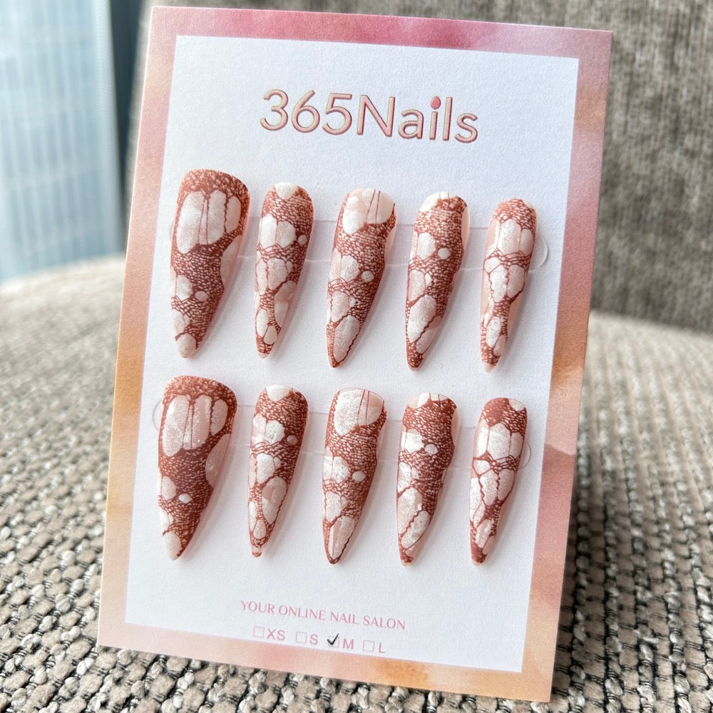 Femme Fatale: "Rust Fishnet Illusion" – Terracotta Brown Lace & Torn Mesh Pattern, Milky White Base Long Stiletto Nails